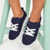 Zapatilla infantil Cruz con cordones Zapatilla infantil Cruz con cordones